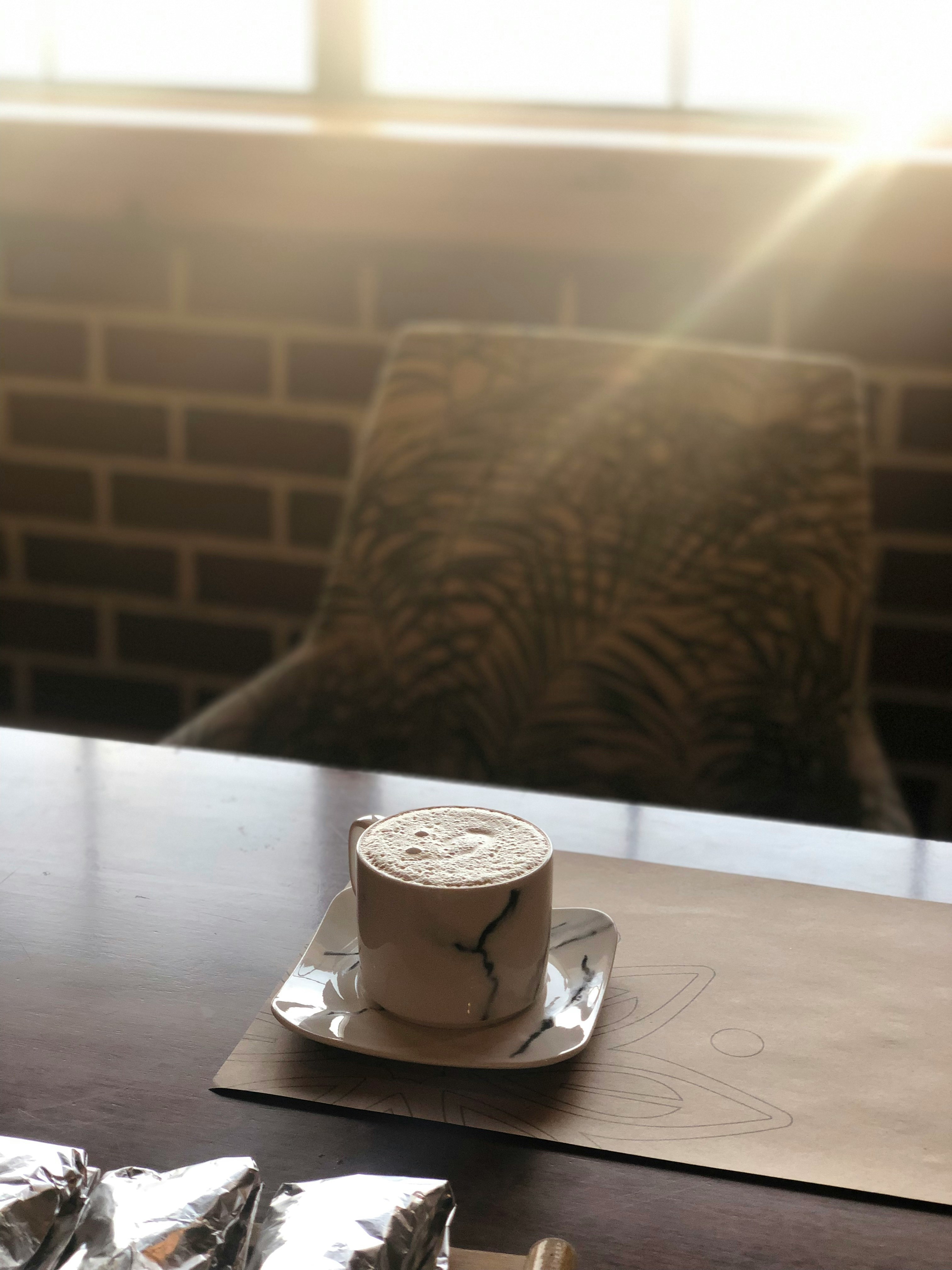 Barista pouring coffee